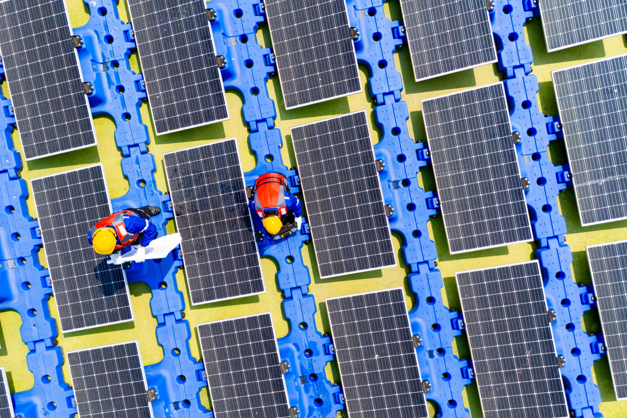 Aerial view floating solar cell power plant with solar cell generate the electric on the lake, Floating solar panels and cell platform on the water ecological energy, Alternative renewable energy.