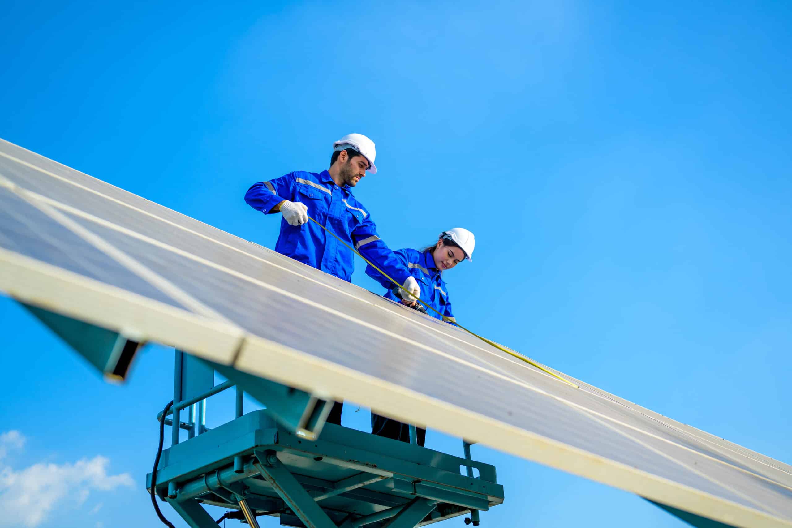 solar-panel-station-engineer-installing-solar-pan-2023-11-27-04-58-08-utc-scaled.jpg